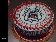 there is a cake decorated with an image of a bulldog