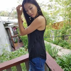 This Slightly Sheer Black Lace Up Tank Has Lace Up Side Details And Single Button Closure Behind The Neck. The Go-To Top For A Night Out Or Over A Cute Bikini Top! Edgy Sleeveless Tops For Day Out, Edgy Summer Blouse For Night Out, Tops Black, Cute Bikinis, Black Lace, Night Out, Lace Up, Womens Tops, Tank Tops