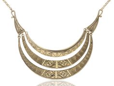 PRICES MAY VARY. Dramatic glamor - Infuse your look with this mystical ethnic inspired necklace. This chunky boho statement piece feature 3 rows antique gold toned layers in a round crescent shape. Featuring a polished metal surface boasting carved geometric and floral etchings detail with a cutout design. Intricate for your love - This artisan looking accessory would make the perfect gift for your loved one. Suitable for a mother, daughter, wife, girlfriend, bestie or grandmother on Mother's Da Egyptian Accessories, Egyptian Necklace, Wedding Showers, Bib Collar, Vintage Inspired Jewelry, Moon Shapes, Inspired Jewelry, Collar Jewelry, Adjustable Necklace