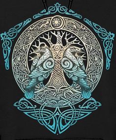 two birds sitting on top of a tree in a circle with celtic designs around it