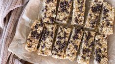 granola bars cut into squares and stacked on top of each other with chocolate chips