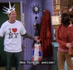 a man in a new york t - shirt is holding shopping bags and talking to a woman