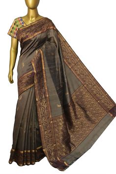 Look consistently classy with our best-in-class collection in Dupion double silk saree which is available in snuff brown color with an amazing hand woven border with the typical zari motif combined with jala work all over the pallu and complete traditional zari weaving to make it timeless. Color: A shade of snuff brown color Technique: Comes with hand weaving work on the border and jala work on the pallu and rest of the saree has traditional work on the rest of the saree. Fabric: Dupion Silk Quality: IndyVogue's Assurance of Silk Mark Certification How To Wash Silk, Raw Silk Saree, Blouse Measurement, On The Border, Dupion Silk, Color Techniques, Zari Work, Saree Fabric, Saree Blouse Designs