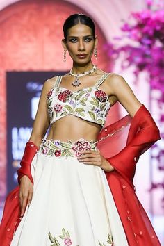 White attached cancan lehenga with placement floral bloom embroidery. Paired with a padded blouse with floral embroidery work and dupatta. - Aza Fashions Bohemian Lehenga With Floral Embroidery, White Floral Embroidered Wedding Choli, Luxury Floral Embroidered Lehenga, Luxury White Floral Print Lehenga, Bohemian Semi-stitched Lehenga With Floral Embroidery, Sweetheart Neck, White Linen, Floral Embroidery, Aza Fashion