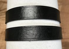 Our leather arm garters are great for pairing with multiple styles. They adjust to your arm size to help keep your sleeves at the desired length. These arm garters are expertly engineered to be put on single handedly. They have a no-snag design to avoid wear on your fine garments. They are sold in Pairs, one for each arm. Will fit 11.5"-15.5" diameter forearm All of our leather products are handmade and hand dyed from natural vegetable tanned leather, there will be some variation in color for ev Steampunk Western, Arm Belt, Sleeve Garter, Rose Sleeve, Skull Sleeve, Sleeve Holders, Leather Products, Adult Costumes, Vegetable Tanned Leather