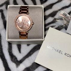 Rose Gold Watch Purchased From Mk Store In Original Box. Pretty Much Brand New Bought One Year Ago. Originally $275.00 As Shown In The Photos Tag Is Sized For My Wrist, But Also Does Come With Previous Piece That Can Be Sized To Your Wrist ( Using Your Own Tool Or Even Taking It To Mk Store To Get It Resized) Michael Kors Round Dial Watch As A Gift, Michael Kors Jewelry With Round Dial For Gifts, Michael Kors Jewelry Gift With Round Dial, Michael Kors Jewelry Gift, Designer Diamond Watch With Metal Dial As A Gift, Luxury Pink Diamond Watch As Gift, Michael Kors Luxury Diamond Watch For Formal Occasions, Luxury Michael Kors Diamond Watch For Formal Occasions, Luxury Michael Kors Diamond Watch