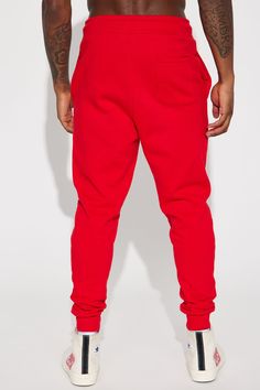 Model Height: 6'1 - Waist: 32 - Wearing Large Big & Tall: Height 6'3 - Waist: 42 - Wearing XXXL Available In Black, Grey, White, Navy, And Red Elastic Waist With Drawstring Side Hand Pockets Back Patch Pocket Ribbed Cuff At Bottom Of Leg 80% Cotton 20% Polyester Imported | Mens Tyson Jogger Pant in Red size XL by Fashion Nova Red Stretch Sweatpants For Streetwear, Red Stretch Sweatpants With Pockets, Red Stretch Casual Bottoms, Red Pants For Winter Streetwear, Casual Fitted Red Pants, Red Fitted Casual Sweatpants, Red Fitted Casual Pants, Red Winter Streetwear Pants, Red Cotton Long Pants