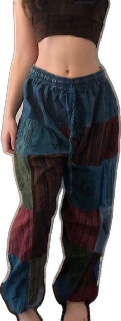 Hippie Wide Leg Patchwork Pants, Hippie Wide-leg Patchwork Pants, Casual Patchwork Pants For Festival, Casual Festival Pants With Patchwork, Bohemian Multicolor Patchwork Bottoms, Multicolor Patchwork Wide Leg Harem Pants, Hippie Festival Pants With Patchwork, Hippie Patchwork Pants For Festival, Hippie Patchwork Bottoms For Festival