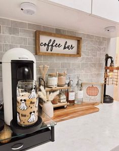 a coffee bar with various items on the counter