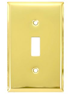 a single light switch cover in gold