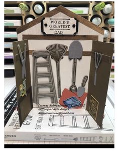 a card made to look like a house with tools on it and the words world's greatest dad