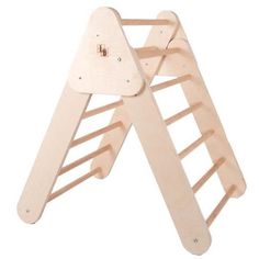 a wooden rack with two pegs attached to the top and one on the bottom