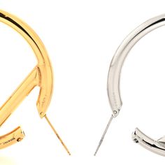 This is an authentic pair of FENDI Metal FF Hoop Earrings in Gold and Silver. These Fendi logo earrings feature a distinctive combination of gold and palladium finishes. Fendi Jewelry, Fendi Logo, Hoop Earrings Gold, Earrings In Gold, Earrings Gold, Gold And Silver, Gold Earrings, Silver Gold, Fendi