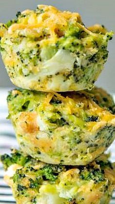 broccoli and cheese muffins stacked on top of each other