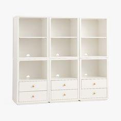 a white bookcase with six drawers