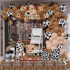 a birthday party with balloons and decorations