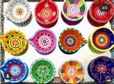 many colorful plates are arranged on a table