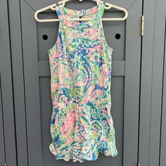 Nwot Lilly Pulitzer Seashell Print Sleeveless Romper. Like New Condition With No Markings Or Stains! Great For Summer. Blue Playful Tank Top, Playful Blue Sleeveless Tank Top, Pink Sleeveless Tank Top For Play, Blue Summer Tank Top For Playwear, Playful Blue Tank Top For Spring, Pink Tank Top For Spring Playwear, Cute Multicolor Sleeveless Tank Top, Pink Tank Top For Summer Playwear, Pink Tank Top For Playwear In Summer