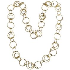 18kt Yellow Gold Circles Necklace with floating diamonds 34" long finished with a toggle closure. The hollow circles follows a consistent pattern throughout creating the effect of scale and movement. There are 14 diamonds weighing approximately 0.75cts total weight. The large circles measure approximately 1" diameter. This necklace can be finished at any length. Please contact me with any inquiries you may have. Yellow Diamond Necklace, Diamond Circle Necklace, Diamond Chain Necklace, Cheap Silver Rings, Butterfly Necklace Gold, Gold Circle Necklace, Toggle Necklace, The Hollow, Cultured Pearl Necklace