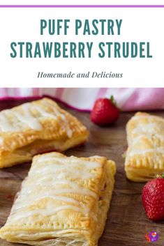 puff pastry strawberry strudel on a cutting board with strawberries