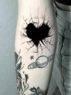 a heart shaped hole in the side of a leg with space and stars on it