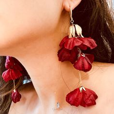 These elegant fabric flower long drop earrings feature beautiful fabric flower long drop dangle under a 24 k gold plate brass bell flower charm and gold plate brass ear wire. The chains and flower caps are also made from high quality 18k gold plated copper.These red and blue flower long drop earrings can fit any occasion such as wedding party, bridal party, Anniversary, Christmas, cocktail party and more. Add these elegant long drop flower earrings to your everyday fashion jewelry collection or as a gift for your loved one. Jewelry Care: See more information about how to care for your jewelry here. Shipping Policy: Orders will be shipped within 1-3 business days. Economy shipping will take 7-14 days to arrive and standard shipping is 1- 4 days for U.S. orders. International shipping time i Festive Red Flower Earrings, Red Drop Earrings With Flower Charm, Red Drop Flower Earrings For Festive Occasions, Festive Red Flower Drop Earrings, Elegant Red Flower Earrings For Festive Occasions, Red Flower Earrings, Christmas Cocktail, Brass Bell, Elegant Fabric