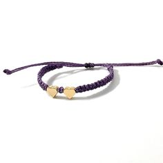 This bracelet is made of purple waterproof rope and two gold plated heart charm. Trendy Purple Braided Bracelet Gift, Trendy Purple Braided Bracelet For Gift, Gold Heart Friendship Bracelets With Sliding Knot, Adjustable Double Heart Yellow Gold Bracelets, Adjustable Double Heart Yellow Gold Bracelet, Adjustable Yellow Gold Double Heart Bracelet, Adjustable Double Heart Bracelet, Gold Heart Bracelet With Sliding Knot, Adjustable Purple Friendship Bracelets With Heart Beads