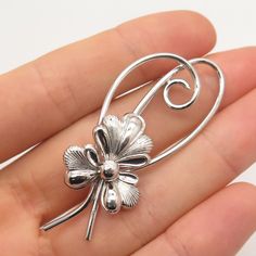 Good vintage condition.  925 Sterling Silver Vintage Forstner Floral Pin Brooch  Weight: 6.7g   WELCOME TO PAWN SHOP We are an actual pawn shop and have been in business for over 25 years. Since 1990, our establishment has been serving a variety of clients by providing them with short term cash solutions and options of liquidity regarding their treasured heirlooms. Acknowledging that today′s customers are very sophisticated and are looking for a variety of investments, our acquisitions are hand- Floral Pins, Pawn Shop, Pin Brooch, 25 Years, Brooch Pin, Brooches, Vintage Jewelry, 925 Sterling Silver, Sterling Silver