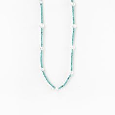 This ocean-inspired Meribella pearl choker necklace is the perfect wardrobe addition. A minimal and unique fashion statement. Afghan turquoise beads adorned with real freshwater pearls. Silver-plated fastening. 16" handmade choker necklace with a 1.5" extendable chain. Real freshwater pearl beads. Afghan stone beads. Handmade Choker Necklace, Handmade Chokers, Bohemian Accessories, Pearl Choker Necklace, Ethical Jewelry, Chain Extenders, Perfect Wardrobe, Pearl Choker, Freshwater Pearl Necklaces