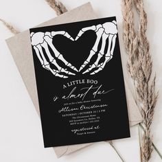 a black and white skeleton handprinted baby shower or birthday party card with the word little boo on it