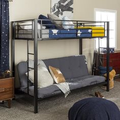 a bunk bed with futon underneath it in a bedroom