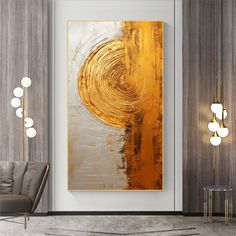 an abstract painting hangs on the wall in a modern living room