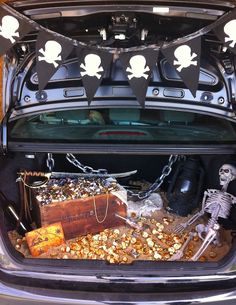 the trunk of a car decorated with halloween decorations