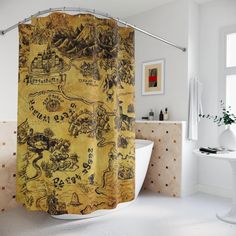 a bathroom with a yellow shower curtain that has a map drawn on it in black and white