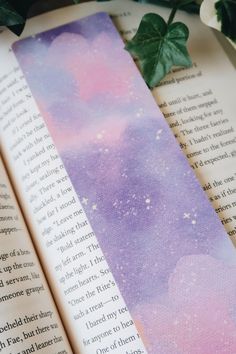 the bookmark is laying on top of an open book