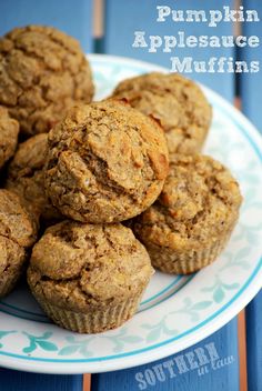 some muffins are on a plate with the words pumpkin applesauce muffins