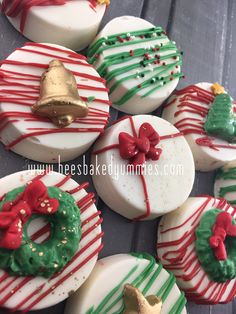 christmas cookies decorated with white and green icing, gold bells and candy canes