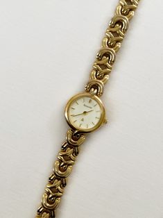 Beautiful Accurist gold plated watch. Braided style band. Super elegant watch, perfect for any occasion. Needs Battery.  Brand: Accurist Condition: Pre-owned, Great Condition  Measurements: Length: 5.75 inches Face: 0.75 inches x 0.75 inches Gold Metal Watch For Formal Occasions, Gold Metal Formal Jewelry And Watches, Formal Gold Metal Watch, Jewellery Branding, Elegant Watch, Gold Plated Watch, Engagement Inspo, Watches Women Fashion, Women Wrist Watch