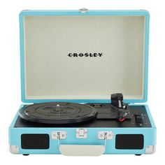 an open suitcase with a record player in it