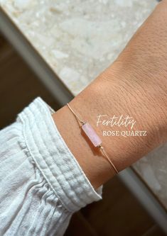 This fertility support bracelet is made with rose quartz which is said to bring support for a successful and safe pregnancy. It is a great gift for your loved ones that are in the process of getting pregnant or that are currently going through IVF. It makes the perfect meaningful mom to be gift! ♥ The bracelet will come with a description card of the gemstone as pictured. ✦ MATERIALS: ~ Natural Rose Quartz Tube (13x4mm) ~ Beading cord in beige ~ Accent Beads: 14k Gold Filled or Sterling Silver ✦ Adjustable Rose Gold Bracelet For Meditation, Adjustable Rose Quartz Crystal Bracelet For Meditation, Adjustable Rose Quartz Birthstone Jewelry, Healing Rose Quartz Beaded Bracelets In Rose Gold, Healing Rose Gold Rose Quartz Beaded Bracelet, Rose Gold Rose Quartz Bracelets For Healing, Rose Gold Rose Quartz Bracelet For Healing, Adjustable Minimalist Rose Quartz Bracelets, Minimalist Adjustable Rose Quartz Bracelets