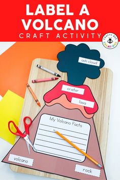 a volcano craft with scissors and crayons on it, next to the text label a volcano craft activity