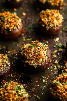 some food that is on top of a pan with sprinkles and seasoning