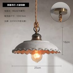 an image of a light fixture with rope hanging from it's side and measurements