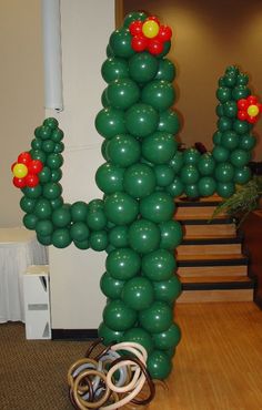 an image of balloon cactus in the middle of a room