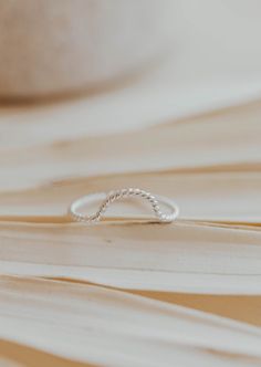 Originally designed to be paired with one of our Gemstone Rings, our Dune Ring stacks beautifully with any Stacking Bands and can hold it's own as a solo ring, too. Twisted wire is hand-shaped and made into a unique stacking ring. Available in 14kt Gold Fill + Sterling Silver. Handmade in Eau Claire, WI. Our jewelry is handmade so each piece will be unique and may vary slightly from what is pictured. Ring Stacks, Backdrops Necklace, Zodiac Rings, Hoop Charms, Stacking Bands, Twisted Wire, Jewelry Case, Stacking Ring, 14kt Gold