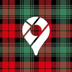 a red and green tartan plaid with a white heart on the center in the middle