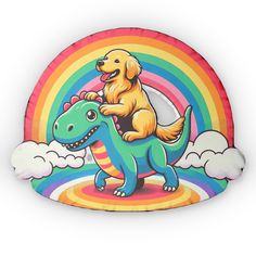 a dog riding on the back of a rainbow colored dinosaur pillow with clouds in the background