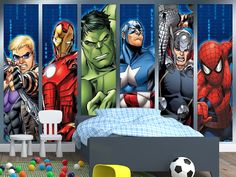 a bedroom with avengers wallpapers and a soccer ball on the floor in front of it