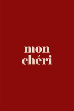 the words mon cher on a red background