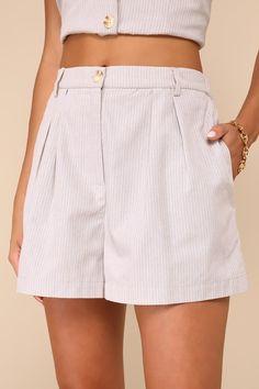 Prepare to make a stylish impression whenever you don the Lulus Posh Certainty Beige Pinstripe Linen Pleated High-Rise Shorts! A pinstriped design accents lightweight, linen-cotton blend woven fabric as it shapes these chic shorts with an elasticized high-rise silhouette, belt loops at the front, and a top button closure with a hidden zip-fly. Pleated accents and side seam pockets complete the tailored silhouette. Pair with the matching top for a complete look! Fit: This garment fits true to siz Elegant Pinstripe Bottoms For Summer, Chic High Waist Striped Shorts, Chic Vertical Striped Shorts For Summer, Chic Vertical Striped Shorts, Chic Striped Bottoms, Chic Striped High-waisted Shorts, Chic Shorts With Vertical Stripes, Chic Summer Shorts With Vertical Stripes, Striped Shorts For Day Out